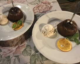 Chocolate soufflé with homemade ice cream with figs