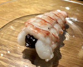 Langoustine ‘sushi’ stuffed with black rice 