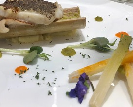 Sole in the reeds. Fish roasted in hollowed out sugar cane served with carrot and white cocao juice infused lengths of sugar cane 