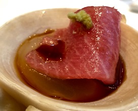 A reference to tuna marrow; miso soup with tuna belly and wasabi