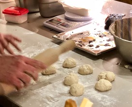 Making pita bread to order 