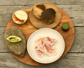 Sourdough bread - ruccola pesto - algae butter - North Sea fish salad - pancetta 