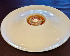 Red pepper piccatte topped with saffron gelee and steamed egg white with star anise 