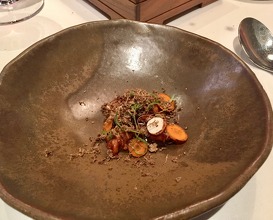Caramelized "Guirra" ewe sweetbreads, roasted onion, tiger-nuts and fresh truffle accompanied by truffle broth.