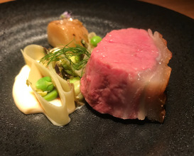 Saddle of lamb, garlic & potatoes from our farm with hogweed & peas