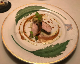 Truffle-Stuffed Breast of Chicken on Savoy Cabbage Braised in Champagne
