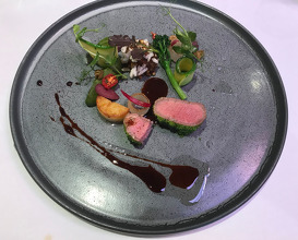 Herb crusted lamb loin, confit neck, smoked olive, salsa verde, rib jus