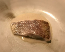 akamutsu from east coast of japan, wrapped with seaweed from Brittany (France) and verbena, steamed in pot with heated stones and poured over sake for 3 minutes, served with fish milk, only made with simmered akamutsu and a touch of lemon juice