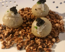 sneaky potato puff topped with caviar 