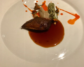 pigeon with cabbage roll stuffed with mushroom and artichoke cream