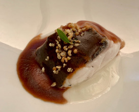 Steamed hake, it's "pil-pil" and red wine sauce