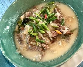 Coconut curry soup with dry aged beef