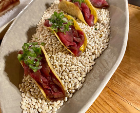 GRILLED BONE AND POLENTA TACOS with venison carpaccio, minced vegetables and tamarind mayonnaise