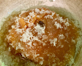 Fermented apples with their cream and 8-month fermentation of garlic, juniper and hot pepper in honey, grated macadamia.