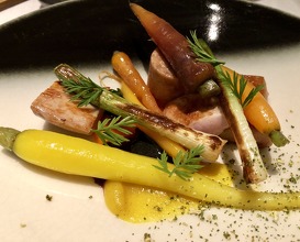 Tasting of suckling pig, carrots, charred leeks, black sesame