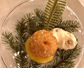 Pomme de pin like a baba, with orange syrup and pine nuts