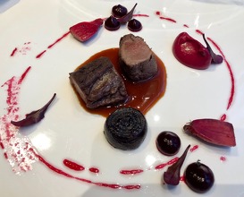 Game meats with romesco and beetroot textures with hazelnut oil