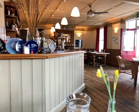 Interior bar and surrounding views of outside 