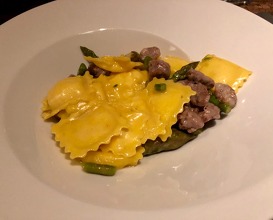 Cheese fondue “agnolotti” with sausage and asparagus 