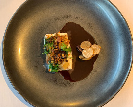 From 9kg turbot, girolles & mousseron served with turbot head brawn, pistacio oil 