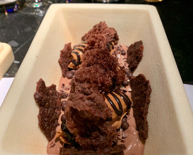 SEVEN TEXTURES OF CHOCOLATE Black mole &e Gianduja mousse, white Chocolate Ganache Spheres and Chocolate ice cream.