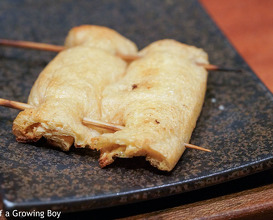 Sticks of chicken at Toritama