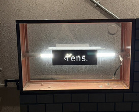 Dinner at tens. (tens.)