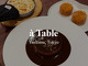 à table (a table)